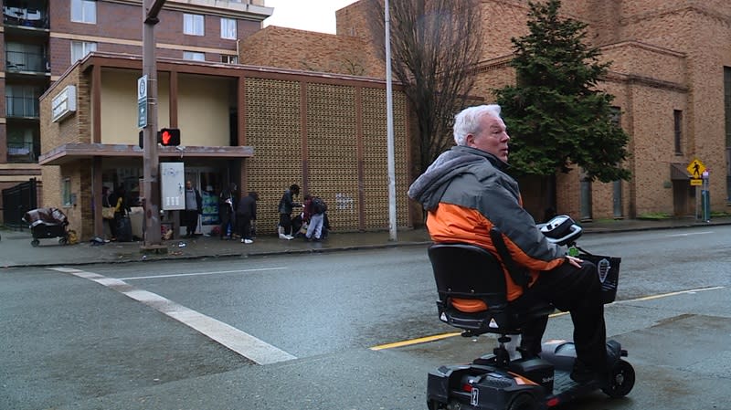 Keith Martin on his scooter at SW 10th and Columbia, where open drug use is prevalent, February 27, 2024 (KOIN)