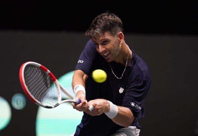 Cameron Norrie hits a backhand