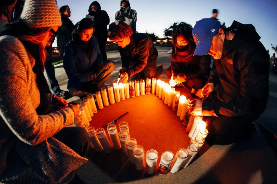 <strong>Community members light candles at a Jan. 30 vigil for Tyre Nichols at Regency Community Skatepark.</strong> "<a href="https://time.com/6251847/tyre-nichols-skateboarding/" rel="nofollow noopener" target="_blank" data-ylk="slk:How Skateboarding Shaped Tyre Nichols,;elm:context_link;itc:0;sec:content-canvas" class="link ">How Skateboarding Shaped Tyre Nichols,</a>" February 1.<span class="copyright">Mark Dillon for TIME</span>