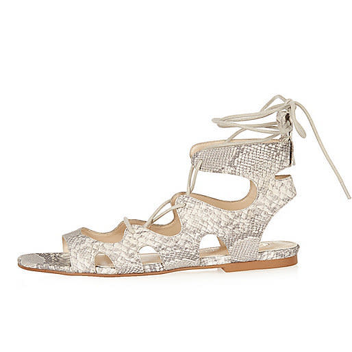 Show some skin (of the reptile variety) with these cute River Island sandals. Yours for just £25.