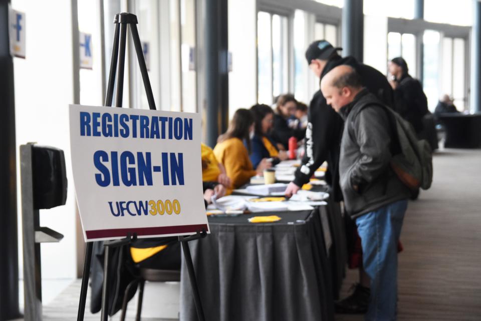 Members of UFCW 3000 vote on an agreement the union's bargaining team negotiated with Safeway and Kroger on Thursday at the Kitsap Conference Center in Bremerton. Members of the union voted to approve the contract.