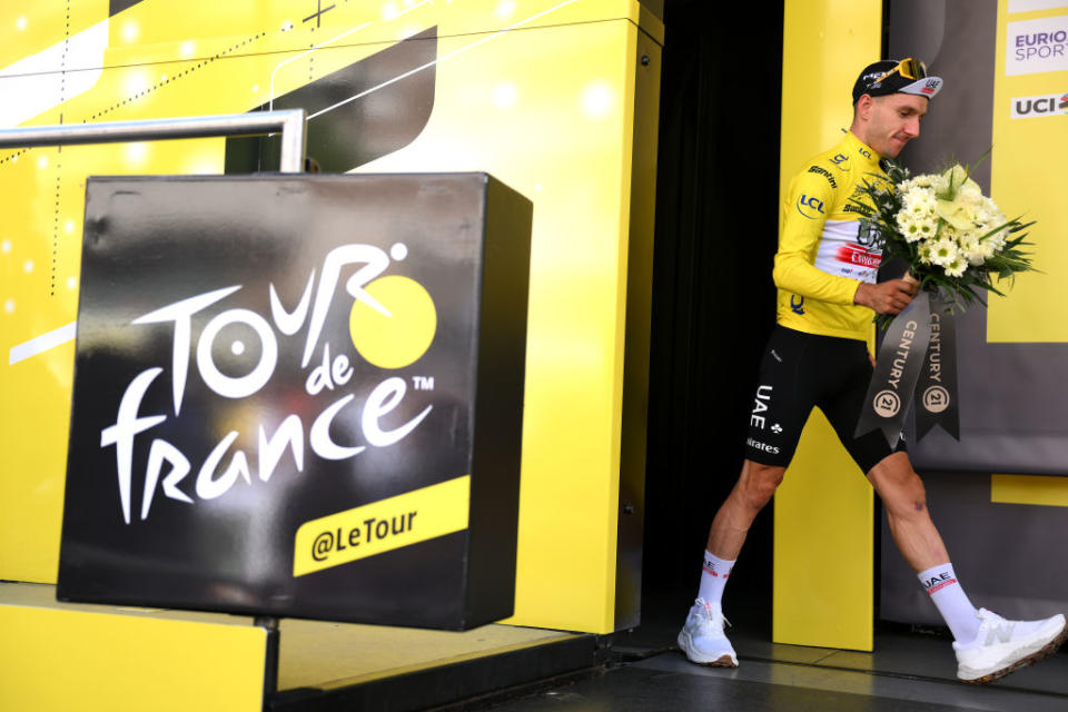 BILBAO SPAIN  JULY 01 Adam Yates of United Kingdom and UAE Team Emirates celebrates at podium as Yellow Leader Jersey winner during the stage one of the 110th Tour de France 2023 a 182km stage from Bilbao to Bilbao  UCIWT  on July 01 2023 in Bilbao Spain Photo by David RamosGetty Images