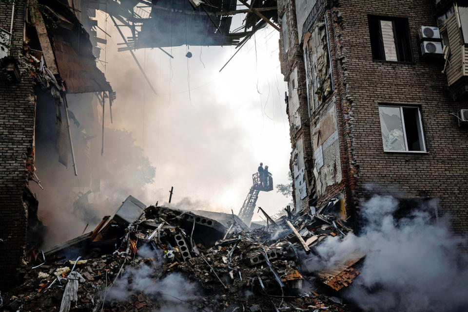 Image: Emergency workers at the scene of a Russian missile strike on Zaporizhzhia, Ukraine, on Monday, Oct. 10, 2022. (Nicole Tung / The New York Times / Redux)