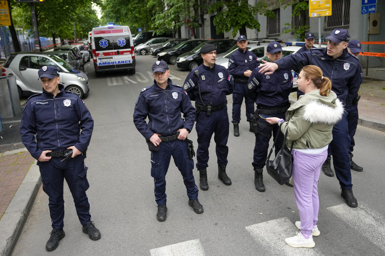 Police block streets around the Vladislav Ribnikar school in Belgrade, Serbia, Wednesday, May 3, 2023. A teenage boy opened fire early Wednesday in a school in central Belgrade, causing injuries. (AP Photo/Darko Vojinovic)