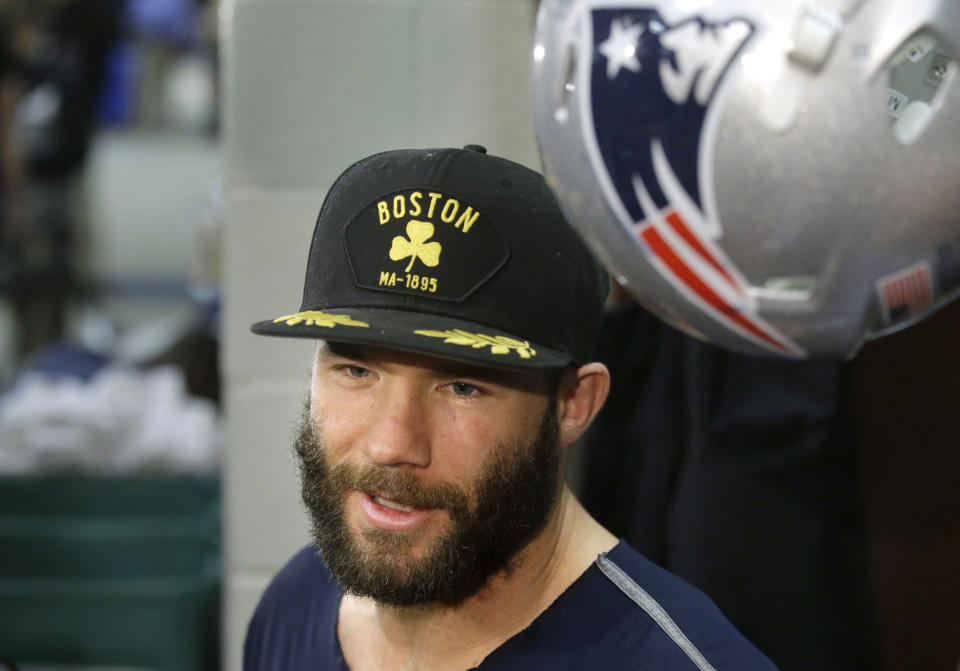 FILE - In this Nov. 16, 2016, file photo, New England Patriots wide receiver Julian Edelman speaks with reporters in the team's locker room before an NFL football team practice in Foxborough, Mass. Citing a knee injury that cut his 2020 season short after just six games, Edelman announced Monday, April 12, 2021, that he is retiring from the NFL after 11 seasons. (AP Photo/Steven Senne, File)