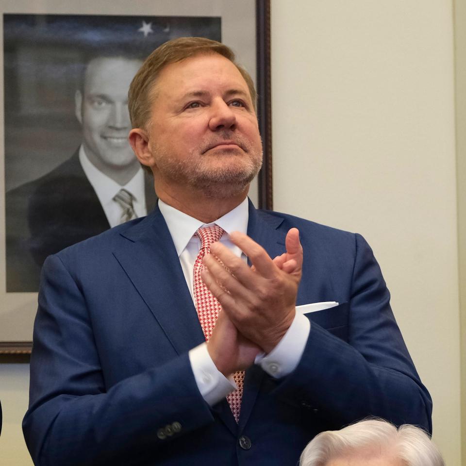 Oklahoma Attorney General Gentner Drummond applauds with other state officials on the first day of the legislative session in February, when Gov. Kevin Stitt delivered his State of the State address.