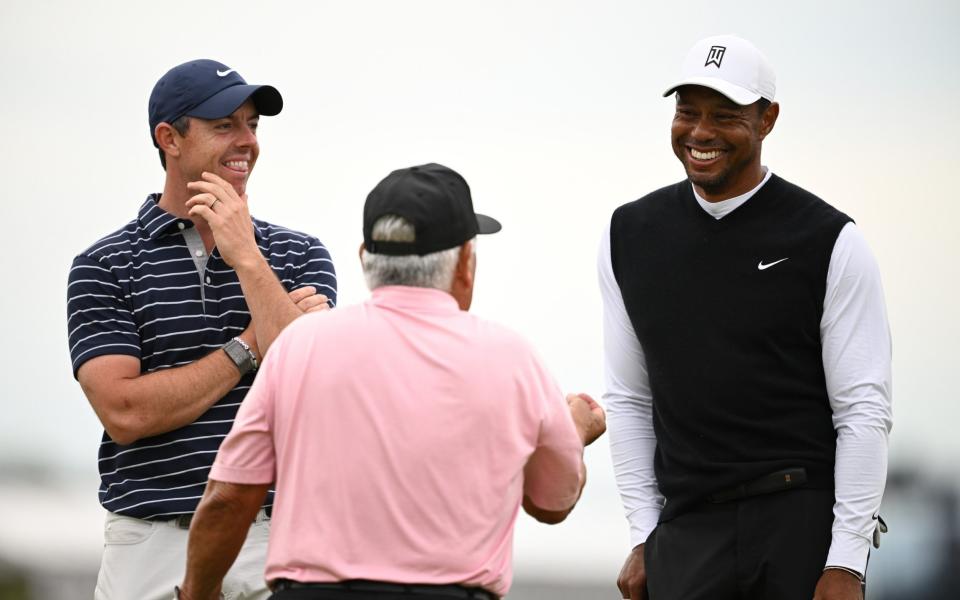 Rory McIlroy and Tiger Woods - GETTY IMAGES
