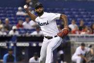 Miami Marlins pitcher Sandy Alcantara throws a runner out at first base after fielding a bunt against the Pittsburgh Pirates during the second inning of a baseball game, Sunday, Sept. 19, 2021, in Miami. (AP Photo/Jim Rassol)