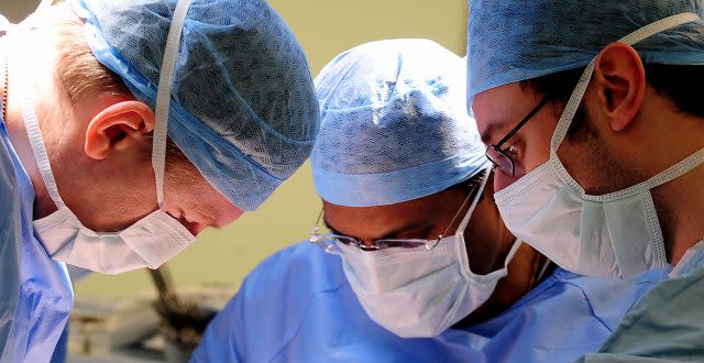 Surgeons performing an operation