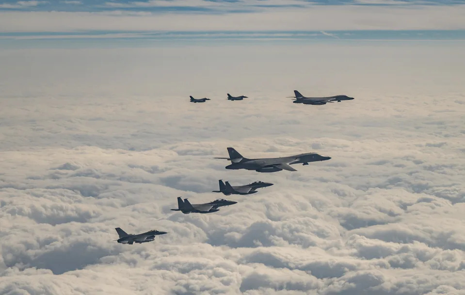 In this photo provided by South Korea Defense Ministry, U.S. Air Force B-1B bombers, F-16 fighter jets, South Korean Air Force F-15K fighter jets and Japanese Air Force F-2 fighter jets fly over South Korea's southern island of Jeju during a joint air drill, Wednesday, Dec. 20, 2023. The United States flew a long-range bomber for joint drills with South Korea and Japan on Wednesday in a show of force against North Korea, days after the North performed its first intercontinental ballistic missile test in five months. (South Korea Defense Ministry via AP)