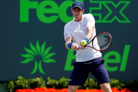 Mar 27, 2015; Key Biscayne, FL, USA; Andy Murray hits a backhand against Donald Young (not pictured) on day five of the Miami Open at Crandon Park Tennis Center. Geoff Burke-USA TODAY Sports