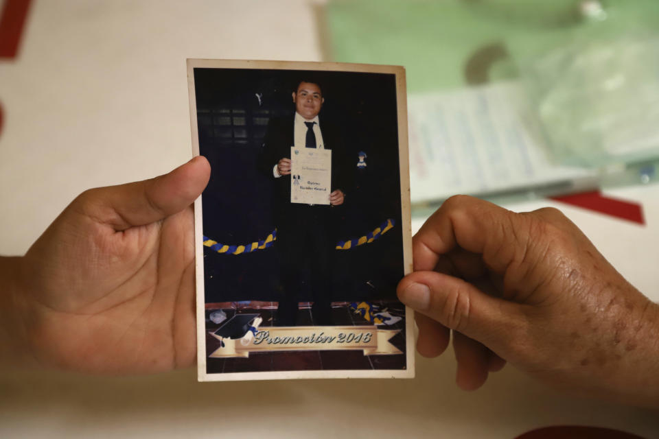 A photograph of a man detained a year ago during the state of emergency is presented at the office of Humanitarian Legal Relief in San Salvador, El Salvador, Thursday, June 29, 2023. Since President Nayib Bukele's government declared a state of emergency on March 27, 2022, authorities have detained 70,000 people, labeling them gang members, though as few as 30% have clear gang ties, according to estimates by human rights group Cristosal. (AP Photo/Salvador Melendez)