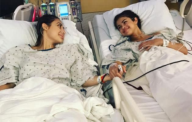 Last week 25-year-old Selena shared the news that she secretly underwent a kidney transplant over the summer to help her battle with lupus - Selena and Francia pictured here holding hands in their hospital beds. Source: Instagram