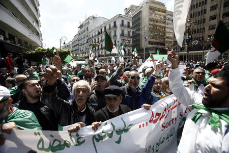 Demonstrators shout slogans during anti government protests in Algiers, Algeria April 26, 2019. REUTERS/Ramzi Boudina