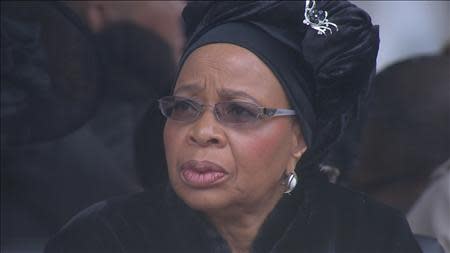 Graca Machel, widow of former South African President Nelson Mandela, is seen in this still image taken from video courtesy of the South Africa Broadcasting Corporation (SABC) at the First National Bank (FNB) Stadium, also known as Soccer City, ahead of Mandela's national memorial service in Johannesburg December 10, 2013. REUTERS/SABC via Reuters TV