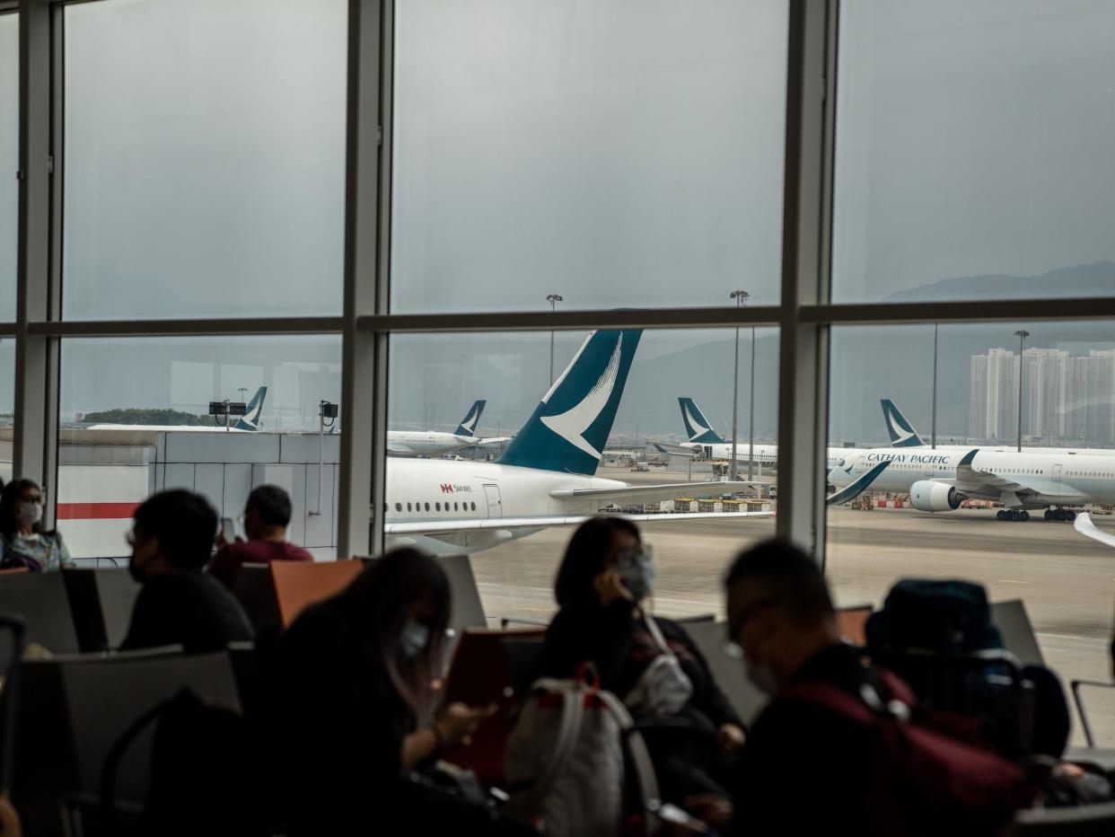 Cathay Pacific plans on the runway at Hong Kong airport.