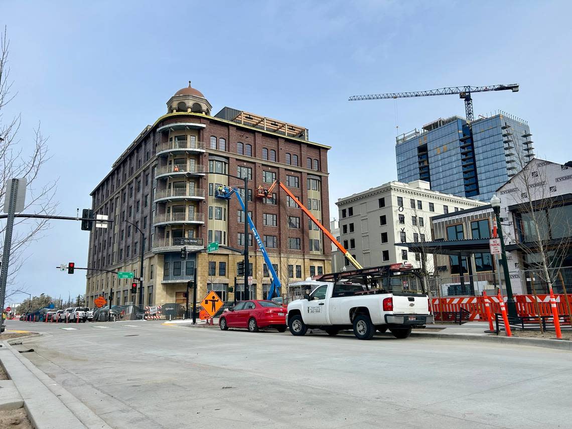 Several multi-story developments have closed streets in downtown Boise, including the Hotel Renegade, seen here in center. The 26-story glass-paneled Arthur apartments can be seen in background at right.