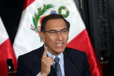 Peruvian President Martin Vizcarra talks during a ceremony to announce a referendum on judicial and political reforms in Lima, Peru October 9, 2018. REUTERS/Mariana Bazo