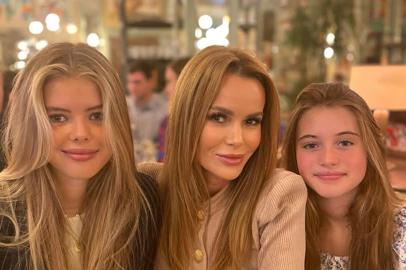 Amanda with her two daughters Lexi, 17, and Hollie, 12