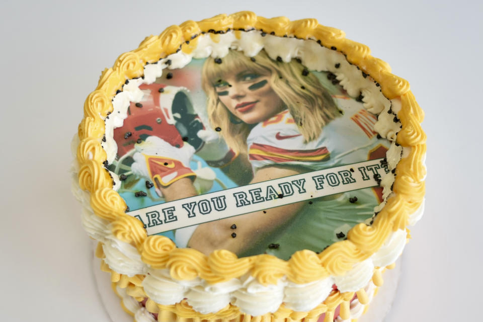 A Taylor Swift-themed "burn away cake" is displayed in Coon Rapids, Minn., Monday, Feb. 5, 2024. Maddie Schmitz, owner of Something Sweet by Maddie Lu, created the Swift/Travis Kelce cakes just in time for NFL football's upcoming Super Bowl. (AP Photo/Mark Vancleave)