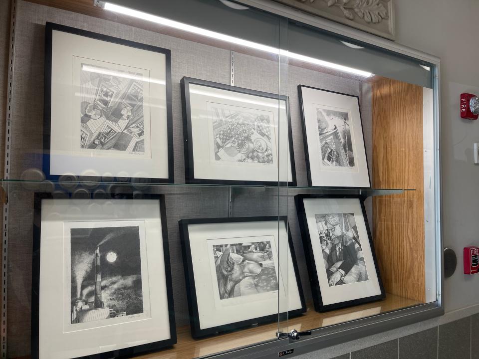 Dale Money’s paintings are proudly displayed on the walls of Gene and Virginia Money’s living room, and his sketches inspired his father to take up drawing. Feb. 1, 2022.