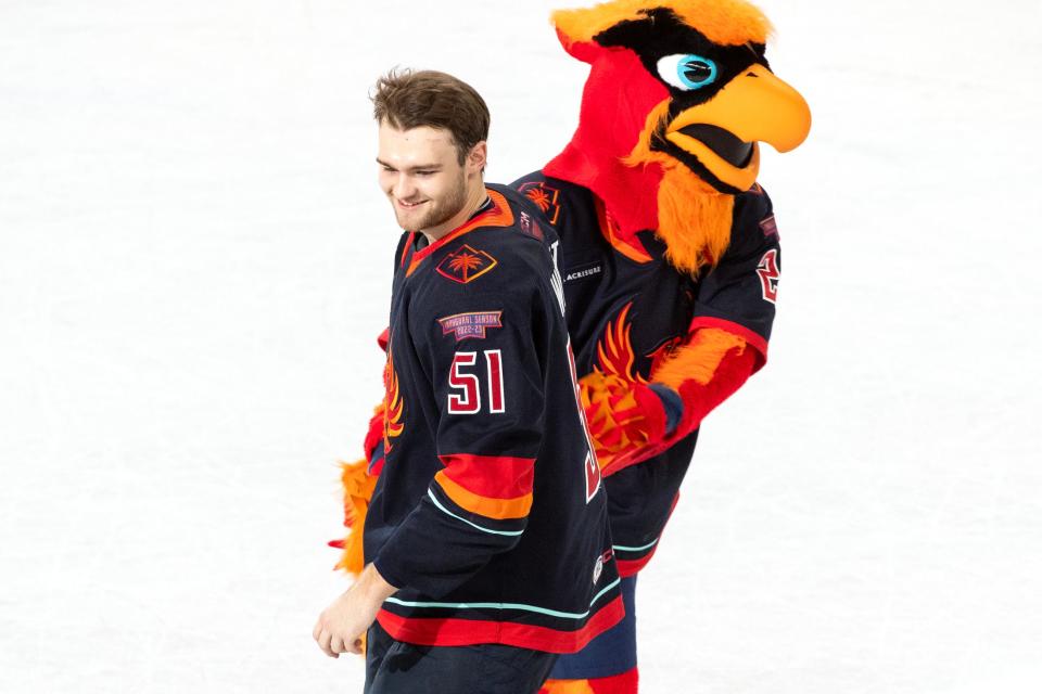 Coachella Valley Firebirds forward Shane Wright  (51) smiles while being announced as one of the players of the game after their win against the Tucson Roadrunners in the first round of Calder Cup playoffs at Acrisure Arena in Palm Desert, Calif., on Sunday, April 23, 2023.