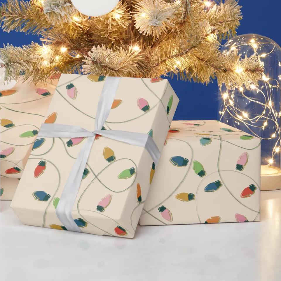 <p><a href="https://go.redirectingat.com?id=74968X1596630&url=https%3A%2F%2Fwww.zazzle.com%2Fretro_vintage_christmas_lights_pattern_wrapping_paper-256498594047323447&sref=https%3A%2F%2Fwww.thepioneerwoman.com%2Fholidays-celebrations%2Fgifts%2Fg41544243%2Fbest-christmas-wrapping-paper%2F" rel="nofollow noopener" target="_blank" data-ylk="slk:Shop Now;elm:context_link;itc:0;sec:content-canvas" class="link ">Shop Now</a></p><p>Vintage Christmas Lights Pattern Wrapping Paper</p><p>zazzle.com</p><p>$13.45</p><span class="copyright">Zazzle</span>