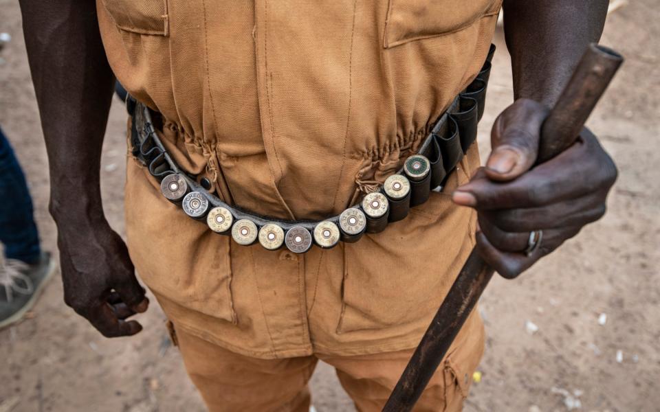 Self defence force the Koglweogo in the village of Poessin on the outskirts of Ouagadougou.  - Simon Townsley/The Telegraph