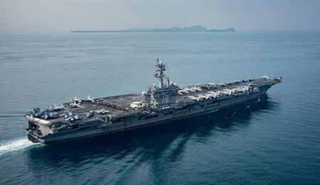 The U.S. aircraft carrier USS Carl Vinson transits the Sunda Strait, Indonesia on April 15, 2017. Picture taken on April 15, 2017. Sean M. Castellano/Courtesy U.S. Navy/Handout via REUTERS