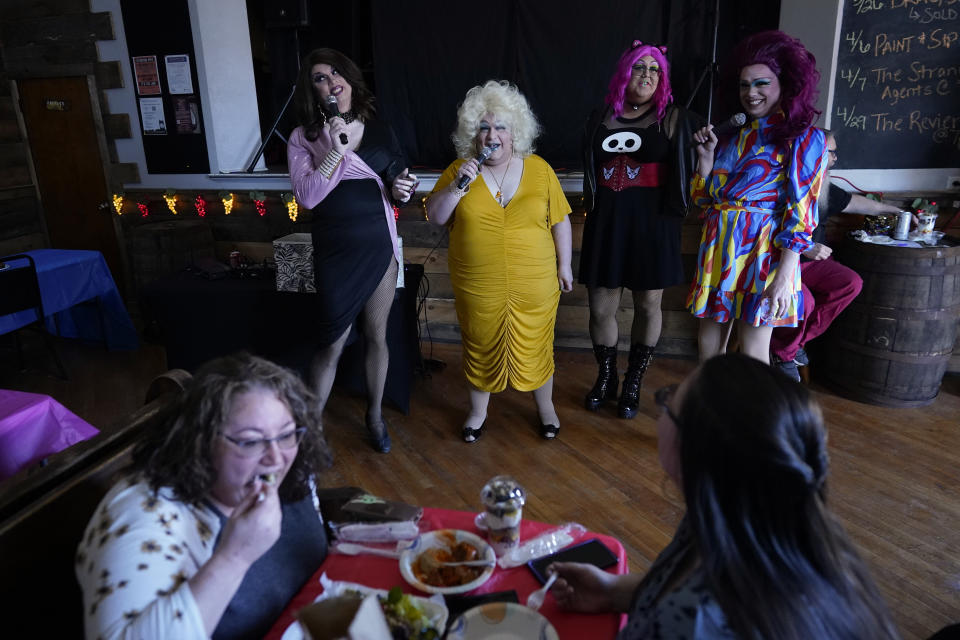 From left, Tequila Daniels, aka Tony Nahodil; Alexus Daniels; Kitty DeVil, aka Emily Poliniak, and Trixy Valentine, aka Jacob Kelley, talk to the audience during "Spring Fever Drag Brunch," Sunday, March 26, 2023, at the Kulpmont Winery in Kulpmont, Pa. (AP Photo/Carolyn Kaster)