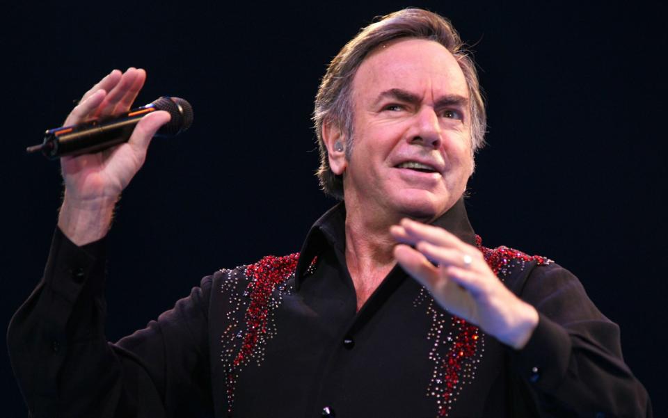 Neil Diamond performing in 2005 - Getty Images Fee
