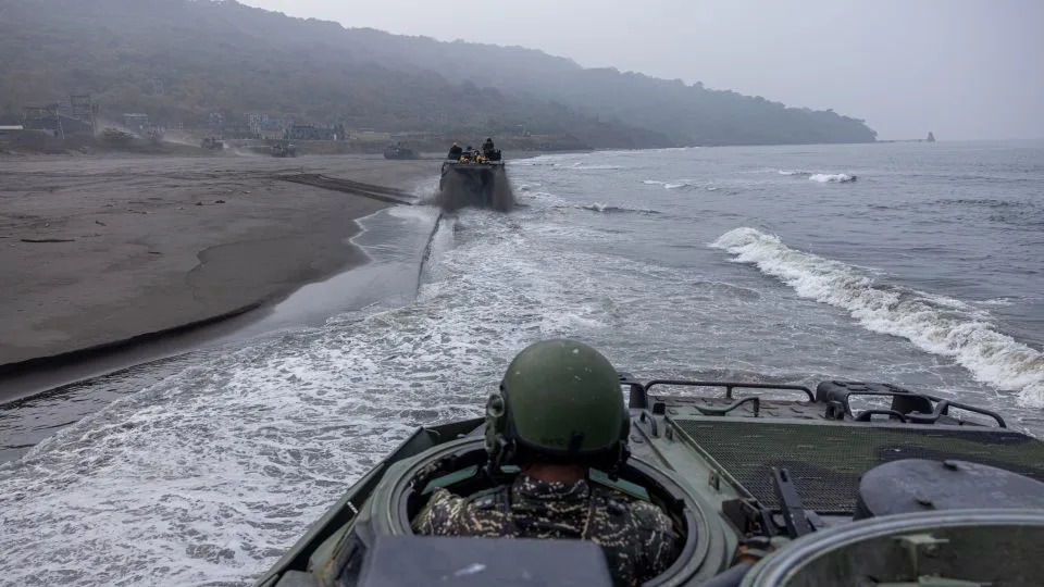 A Taiwanese soldier maneuvers an amphibious vehicle during a two-day military drill to show combat readiness at a base in Kaohsiung, in January last year. - Annabelle Chih/Getty Images