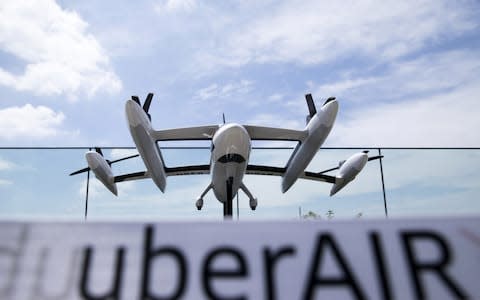 Transport company Uber unveiled its flying car project at a Tokyo Expo in August - Credit: Tomohiro Ohsumi/Bloomberg