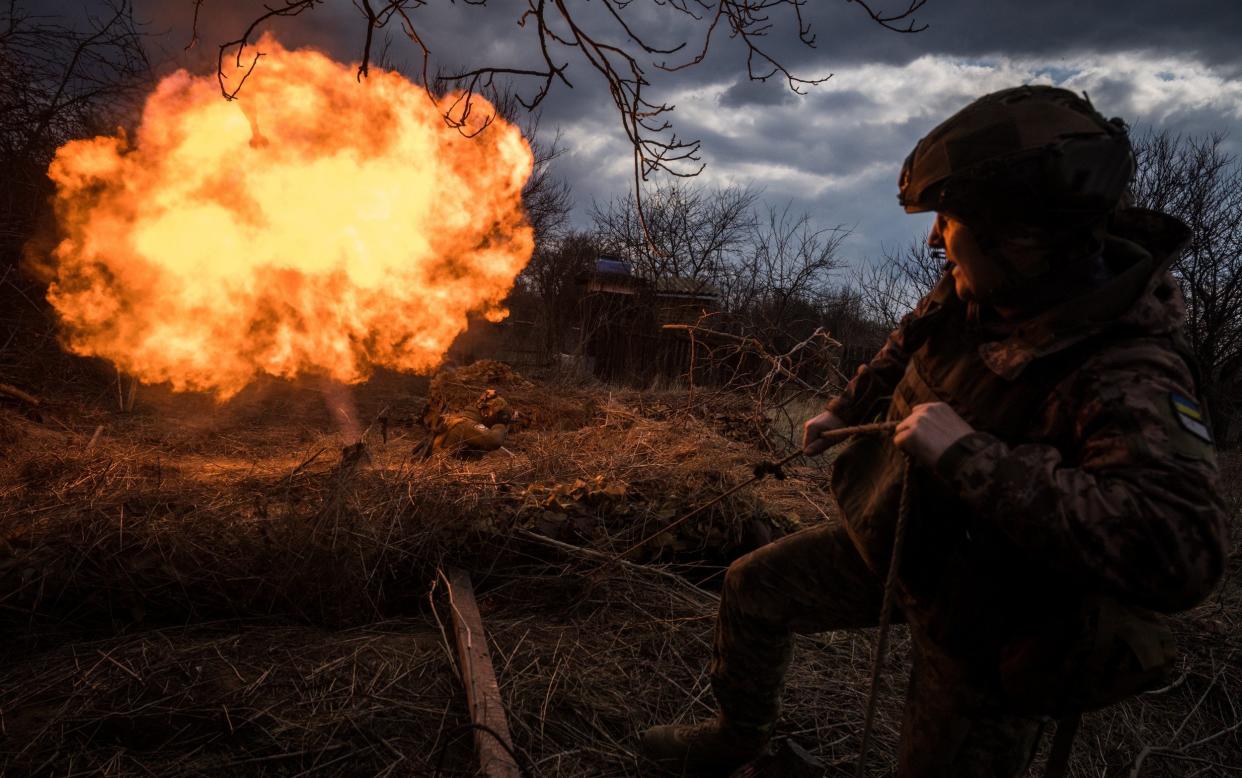 The soldier fire a mortar shell