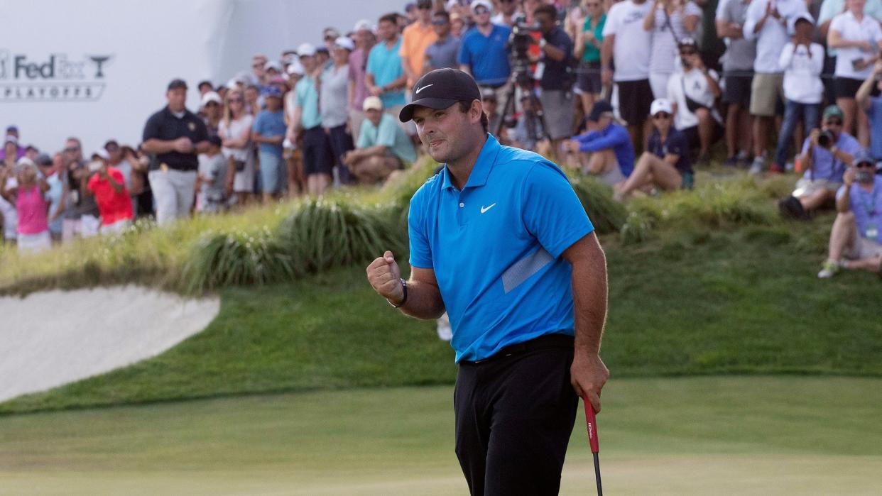 Mandatory Credit: Photo by Mark Lennihan/AP/Shutterstock (10359779x)Patrick Reed pumps his fist on the 18th hole as he wins on the Northern Trust golf tournament at Liberty National Golf Course, in Jersey City, N.