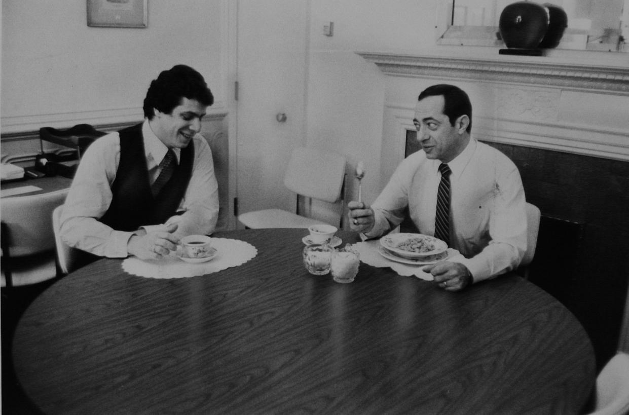 Gov. Mario Cuomo shares breakfast with son Andrew on Jan. 30, 1983.