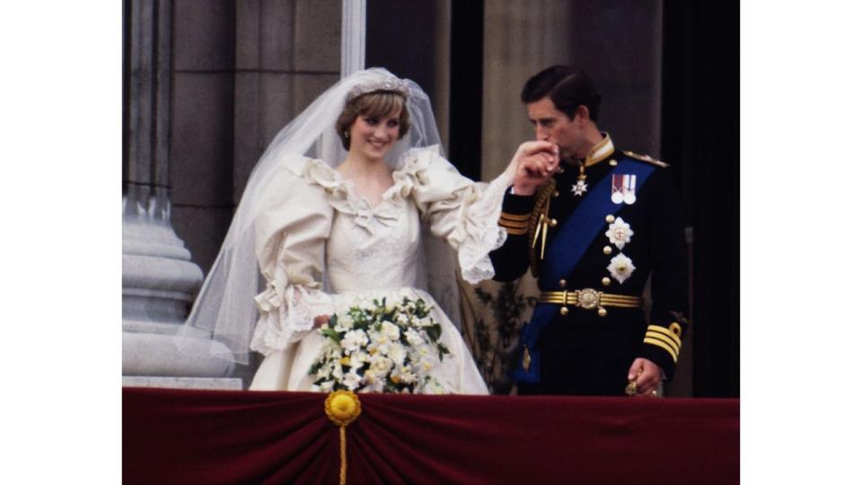 The Prince and Princess of Wales on the balcony of Buckingham Palace on their wedding day, 29th July 1981. 