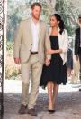 <p>Meghan gazes up at Harry as they visit the Andalusian Gardens in Rabat, Morocco. </p>