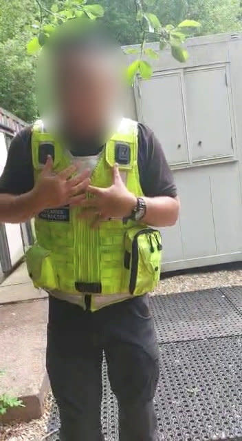 Video grab of the incident where Corin Hancock, wife of Rob Chislett, entering the shooting range at Pond Ground Quarry, Devon, nearby her home to confront armed police officers training on assault weapons without a permit. See SWNS story SWPLgunfire. This is the moment a mum confronts armed police on a firing range next to her home - which the family discovered didn't even have planning permission. Corin Hancock, 34, was able to wander up to cops wielding massive guns - demanding they stop. Corin, 34, and husband Rob, 48, are in the middle of Britain's most explosive neighbour dispute - with local armed officers. Rob and Corin say their children are afraid to go outside as cops fired high-calibre guns up to four times a week - without a permit.  

 
 