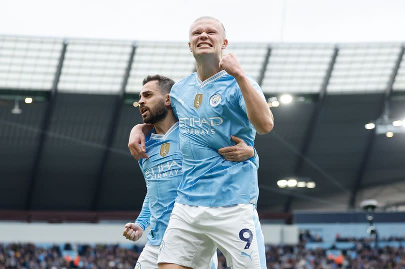 Erling Haaland of Manchester City celebrates after scoring a goal to make it 1-0 during the Premier League match between Manchester City and Wolverhampton Wanderers at Etihad Stadium on May 4, 2024