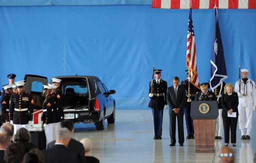 US President Barack Obama and Secretary of State Hillary Clinton bow during a ceremony marking the return of the remains of four Americans killed in Benghazi, Libya, at Andrews Air Force Base in Maryland, September 14. Obama has carved out a clear advantage in the White House race even as he juggles the demands of his re-election campaign with managing a raging Middle East crisis