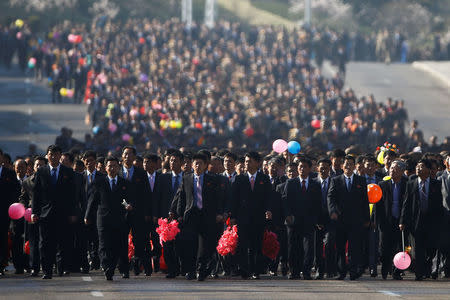 Thousands of people arrive for an opening ceremony of a newly constructed residential complex in Ryomyong street in Pyongyang, North Korea April 13, 2017. REUTERS/Damir Sagolj