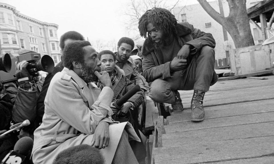 Dick Gregory, the political satirist and activist, in front of the MOVE headquarters in Philadelphia, 10 March 1978. Gregory tried to mediate the long standoff between the city and the radical group.