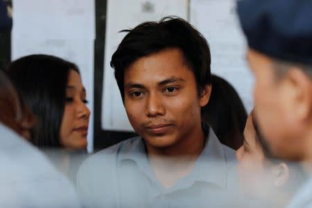 Detained Reuters journalist Kyaw Soe Oo is seen during a break at the court hearing in Yangon, Myanmar February 1, 2018. REUTERS/Jorge Silva