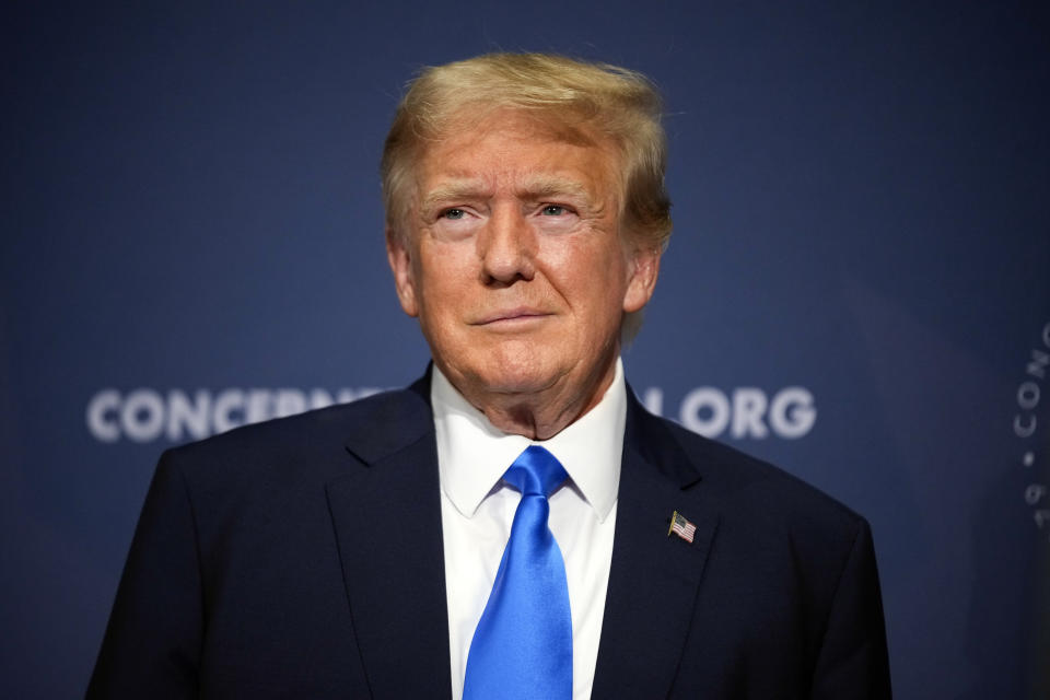 FILE - Former President Donald Trump stands on stage before speaking at a Concerned Women for America Summit at the Capitol Hilton, Friday, Sept. 15, 2023, in Washington. (AP Photo/Andrew Harnik, File)