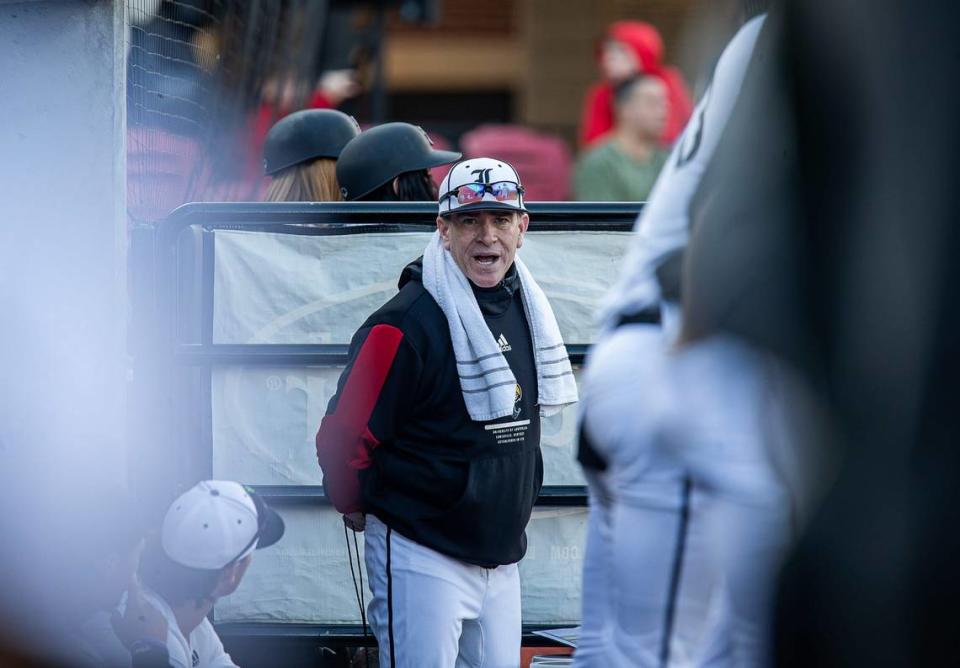 Louisville head coach Dan McDonnell yelled to his team in the dugout as the Cardinals hosted the Xavier Musketeers in Louisville’s home opener of the 2024 season on Wednesday afternoon at Jim Patterson Stadium. Louisville fell to Xavier 9-1. Feb. 21, 2024