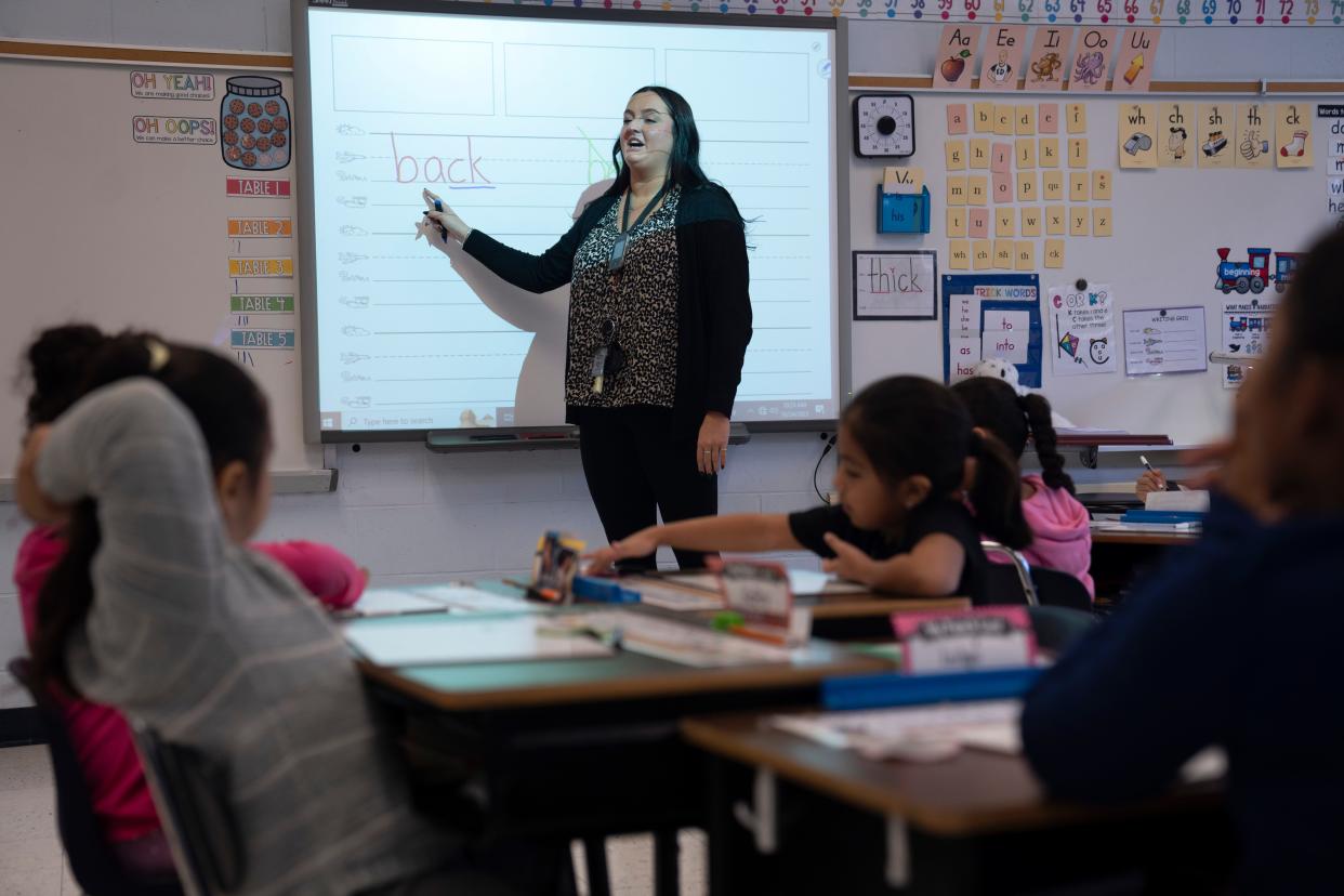 Keely Hassert teaches students in her first grade class phonemic awareness and foundational reading skills at Clifton School 17.