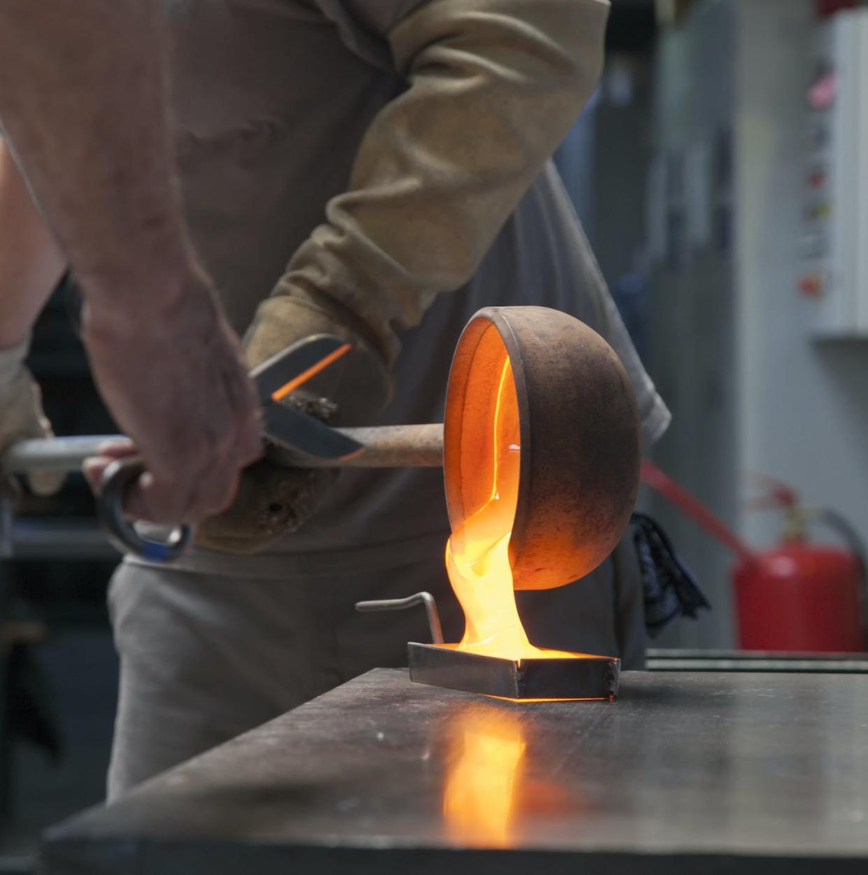 Most glass is made by melting down soda ash, limestone and quartz sand. <a href="https://www.gettyimages.com/detail/photo/foundry-royalty-free-image/503698461?phrase=pouring+molten+glass&adppopup=true" rel="nofollow noopener" target="_blank" data-ylk="slk:gezgin01/iSock via Getty Images;elm:context_link;itc:0;sec:content-canvas" class="link ">gezgin01/iSock via Getty Images</a>