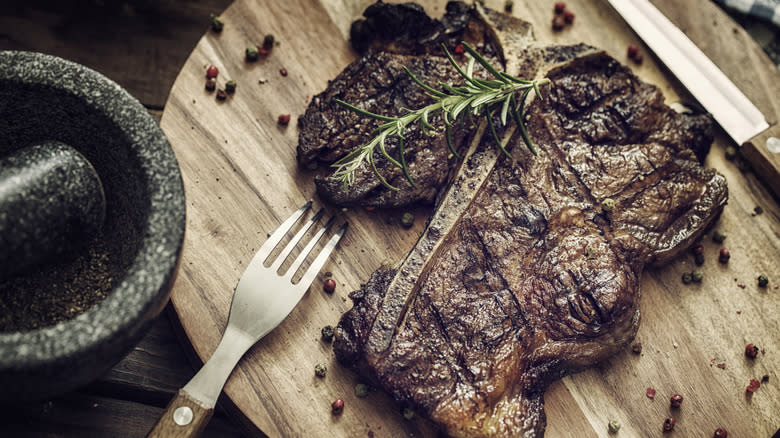 T-bone steak on a cutting board