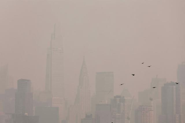 Canada wildfires clouds New York City sky for Yankees game